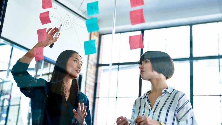 two women discussing business