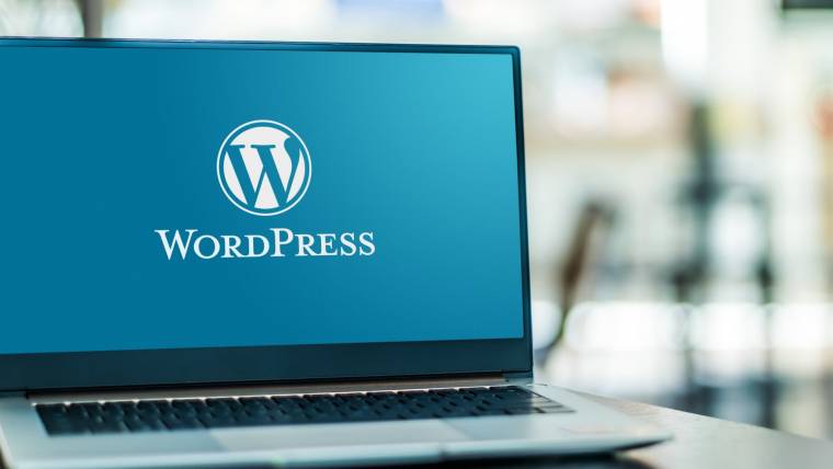 Laptop showing Wordpress logo