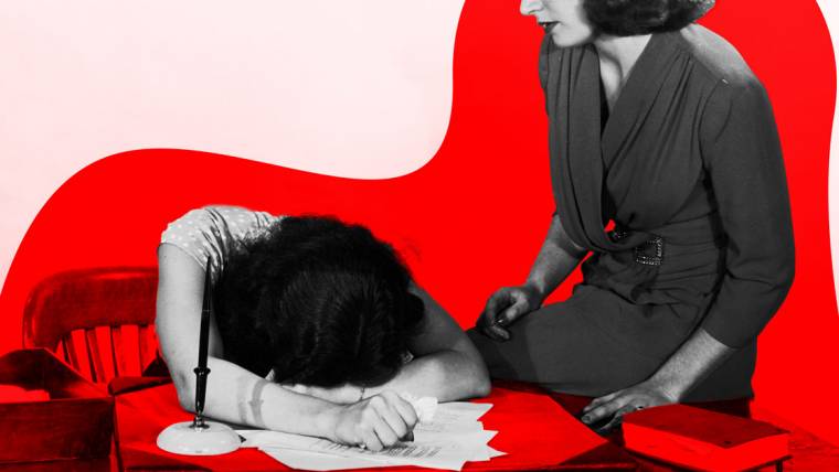 women with head down on desk and papers