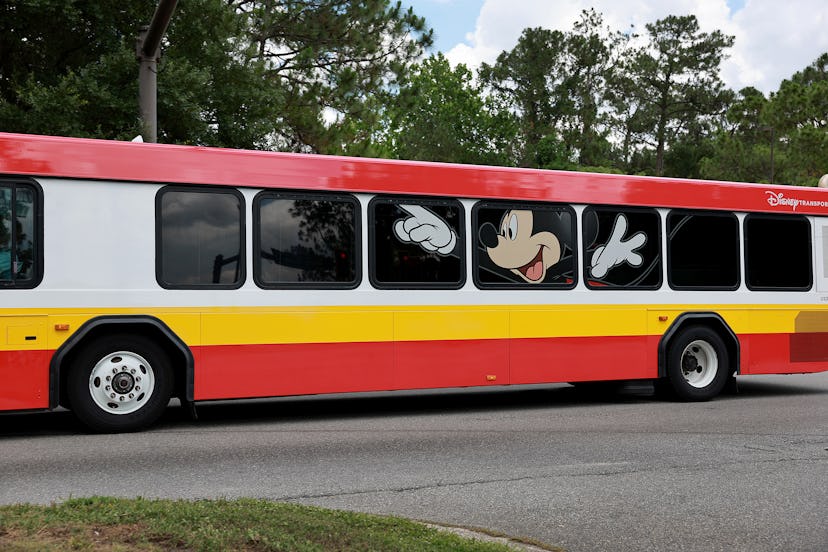 ORLANDO, FLORIDA - MAY 22: A Disney transportation bus drives near Walt Disney World on MAY 22, 2023...